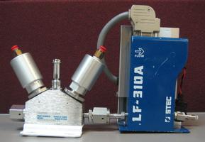 https://www.Labjupiter.com/clientresources/65489/65493/03/92603/136391-a-O111-STEC-Liquid-Flow-Controller-w-Pneumatic-3-Way-Valve.jpg